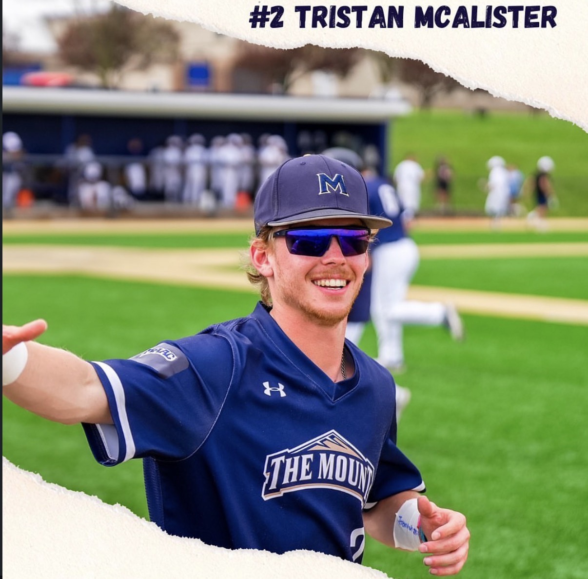 Tristan McAlister smiling in a Mount St. Mary's baseball uniform